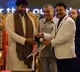 Mega fans in USA felicitated Chiranjeevi in a grand style