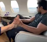 Ram Charan Foot Massage To Upasana Konidela While Flight Jamnagar