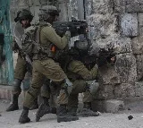 Israel detains 22 Palestinians in West Bank, including prisoners released in 'swap deal'