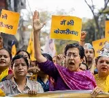 AAP holds protests, candle marches against party chief's arrest