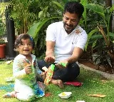 Telangana CM celebrates Holi with grandson