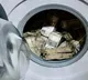 Probe Agency ED Finds Rs 2 crore and 50 Lakhs Stashed In Washing Machine