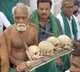 Tamil Nadu farmers protest over crop prices in Delhi with skulls bones