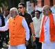 PM Modi Play with Child after Casting his Vote in Ahmedabad