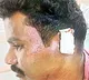 YSRCP leader cuts ear of TDP follower
