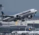 One dead, more than 30 injured on turbulent Singapore Airlines flight
