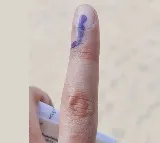 Family with the help of police utilize their vote in Amalapuram