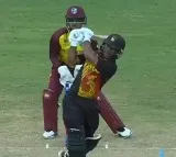 Papua New Guinea scores 136 runs for 8 wickets against West Indies