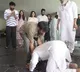 Pawan Kalyan touches Chiranjeevi feet
