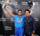 Sachin Tendulkar appearing alongside his wax figure at Madame Tussauds New York