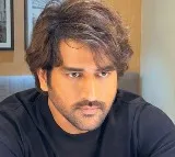 MS Dhoni New Hair Style Photos goes Viral on Social Media