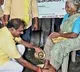 Minister Nimmala Rama Naidu Washes Feet of Pensioner