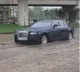RollsRoyce Ghost breaks down on waterlogged road