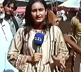 Bull interrupts live TV coverage hits Pakistani female journalist