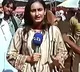 Bull interrupts live TV coverage hits Pakistani female journalist