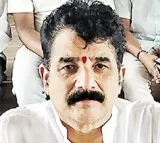 Pot holes lead to his defeat admits former mla karanam Dharmasri