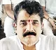 Pot holes lead to his defeat admits former mla karanam Dharmasri