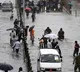 Heavy downpour leaves city waterlogged local train services hit