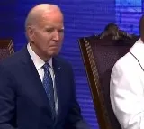 Joe Biden sits in a trance at church