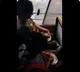 Women peels garlic while free traveling in TSRTC bus