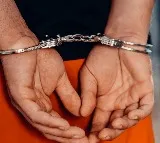 Man dragging his wife Sumitra tied up with motorcycle through village