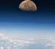 NASA astronaut Matthew Dominick captured a photo of the moon setting over the Pacific