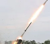 N.Korea test-fires multiple rocket launcher equipped with new guidance system