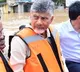 Chandrababu Naidu visits flood-affected Vijayawada in a boat