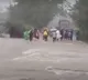 TGRTC bus struck in flood water in Warangal district