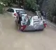 Two Cars Swept Away In Floods
