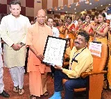 An unconventional tribute: Yogi Adityanath descends from dais to honour injured teacher