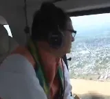 Union Minister Chouhan undertakes aerial survey of flood-hit Khammam, meets farmers