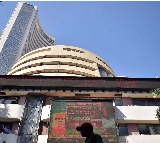Sensex closes down by 398 points, Tata Motors and SBI top losers