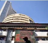Sensex closes down by 398 points, Tata Motors and SBI top losers
