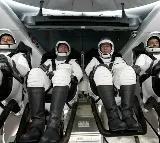 US astronauts complete first commercial spacewalk