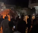 BRS workers abstructs police vehicles carrying Harish Rao and other leaders