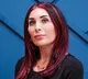laura loomer who is far right conspiracy theorist travelling with trump