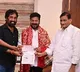 Adisheshagiri Rao gives rs 25 lakh cheque to CM Revanth Reddy