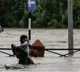 Nepal to aid bereaved families as flood death toll rises to 209