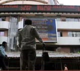 Sensex closes down by 167 points, IT, realty stocks gain