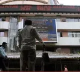 Sensex closes down by 167 points, IT, realty stocks gain