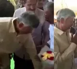 AP CM Chandrababu Touches Worker Feet