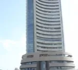Sensex opens in red after bumper Diwali opening, Nifty below 24,300