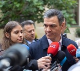 Spanish PM pledges full support after flash floods kill at least 64 in eastern Spain