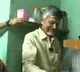 Chandrababu distributes free gas cylinder to a woman