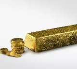Gold prices likely to further come down with no near-term positive triggers