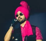 Diljit Dosanjh sings as man proposes marriage to girlfriend on stage