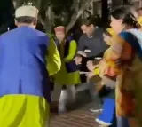Dhoni and Sakshi Join Locals for Traditional Dance in Rishikesh