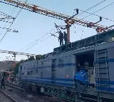 Rail engine drags high tension wires in Vizag railway station
