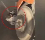 UP Men Dragged Under Speeding Truck